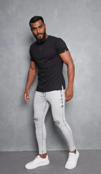 CALÇA JEANS SKINNY MARMORIZADA DETALHE NO JOELHO