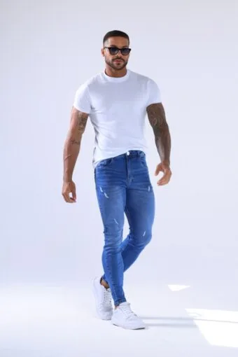 CALÇA JEANS SKINNY AVIAMENTOS BRANCOS E DESTROYED